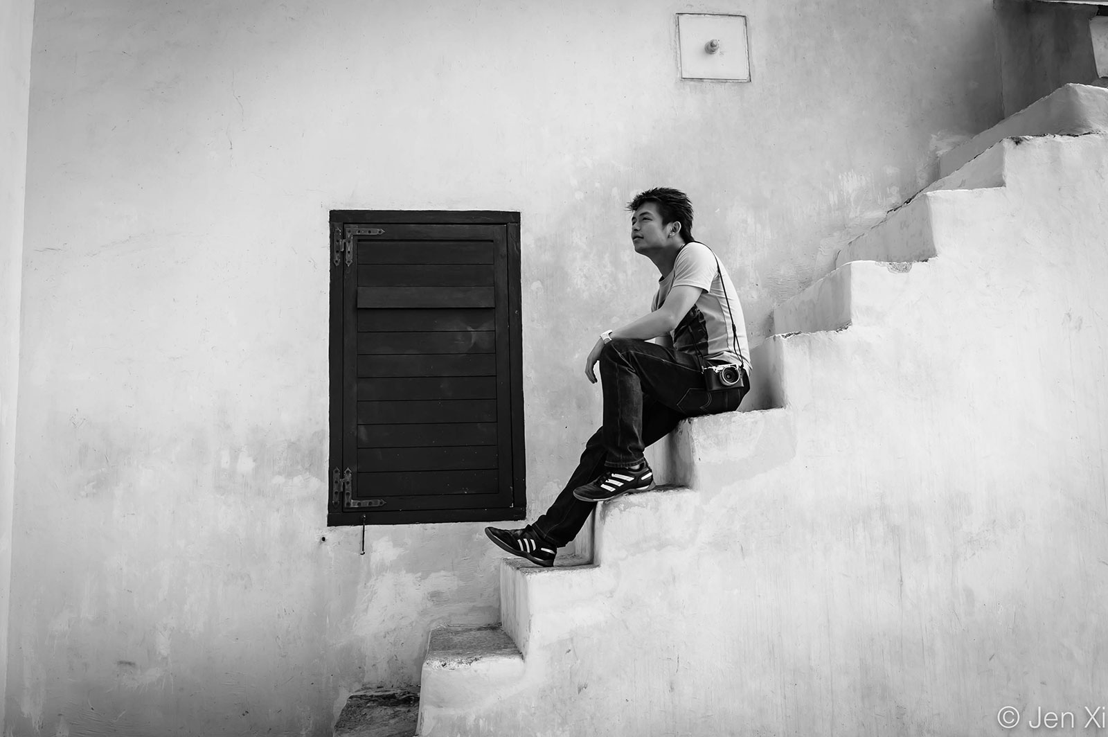 Man sitting on a flight of stairs
