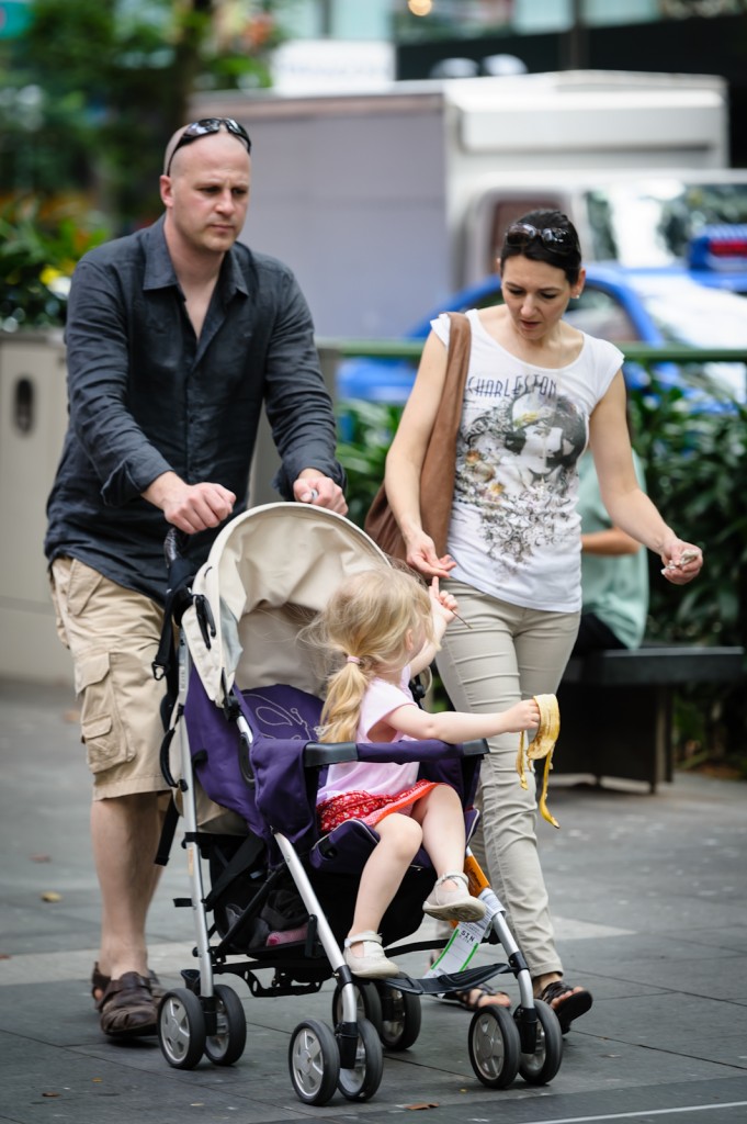 Street photography - Couple with a child in pram