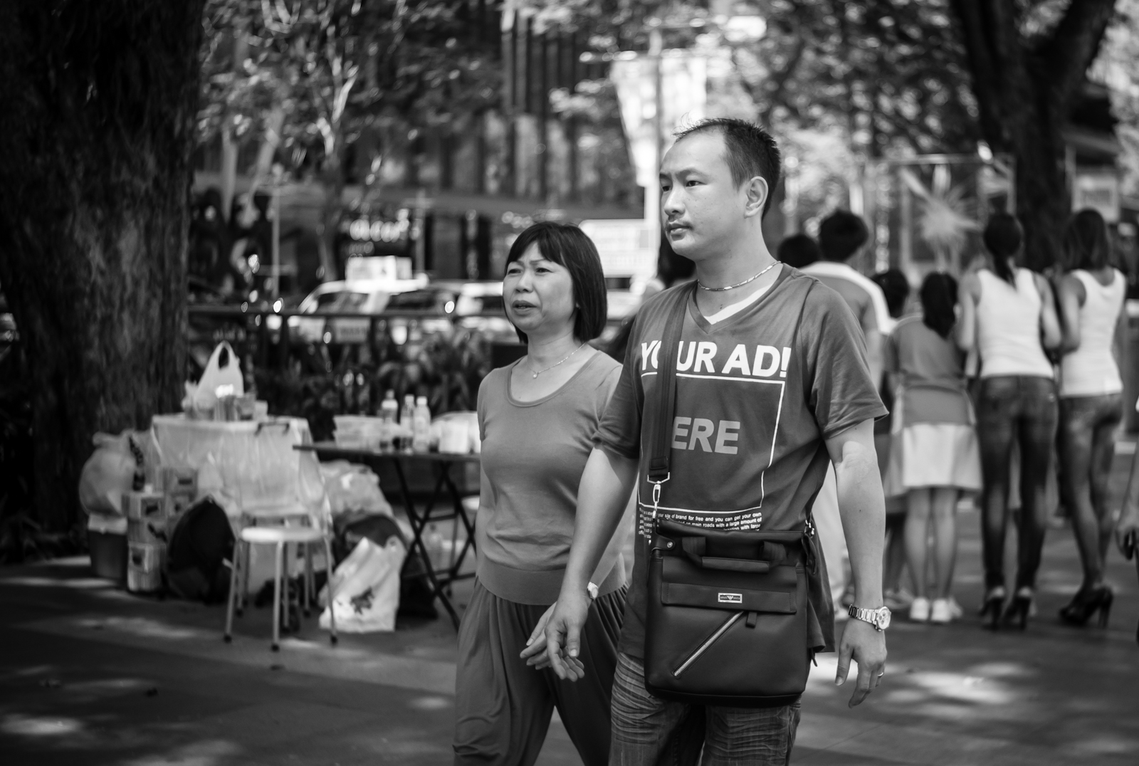 Street photography - man wearing a t-shirt that days 