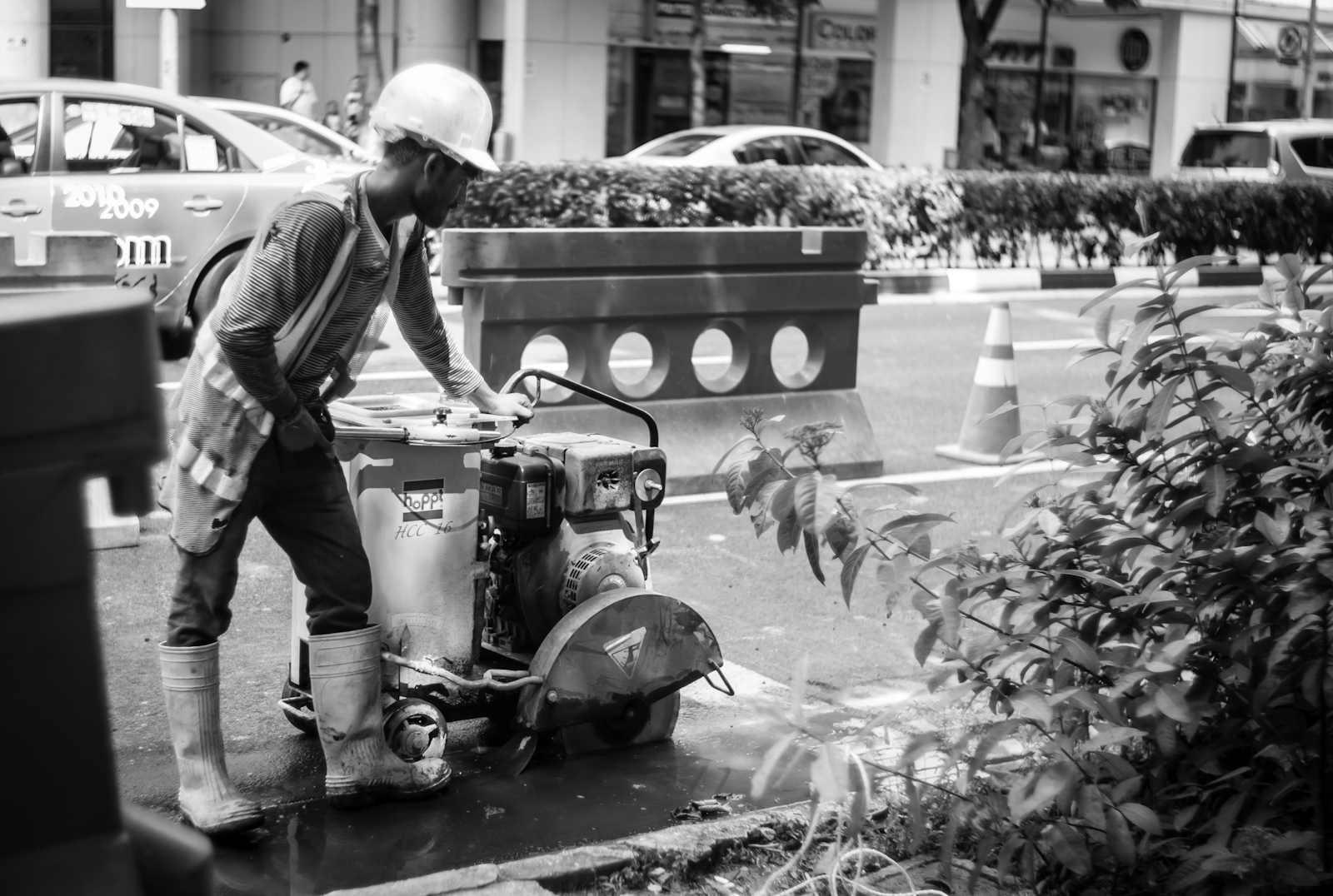 Street photography - Construction worker along the road