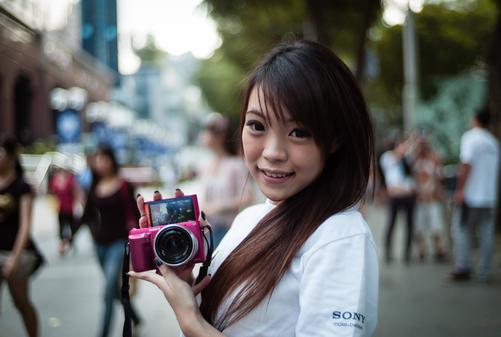 Street photography - Girl promoting Sony NEX camera