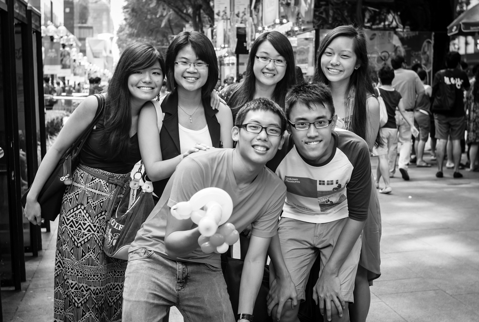 A group of friends along Orchard Road