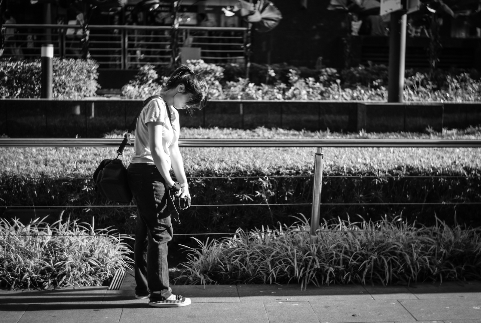 Photographer shooting along Orchard Road