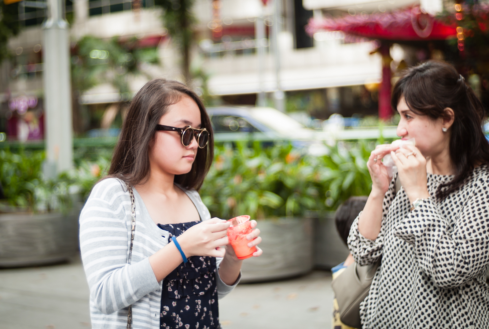 Two woman along Orchard Road