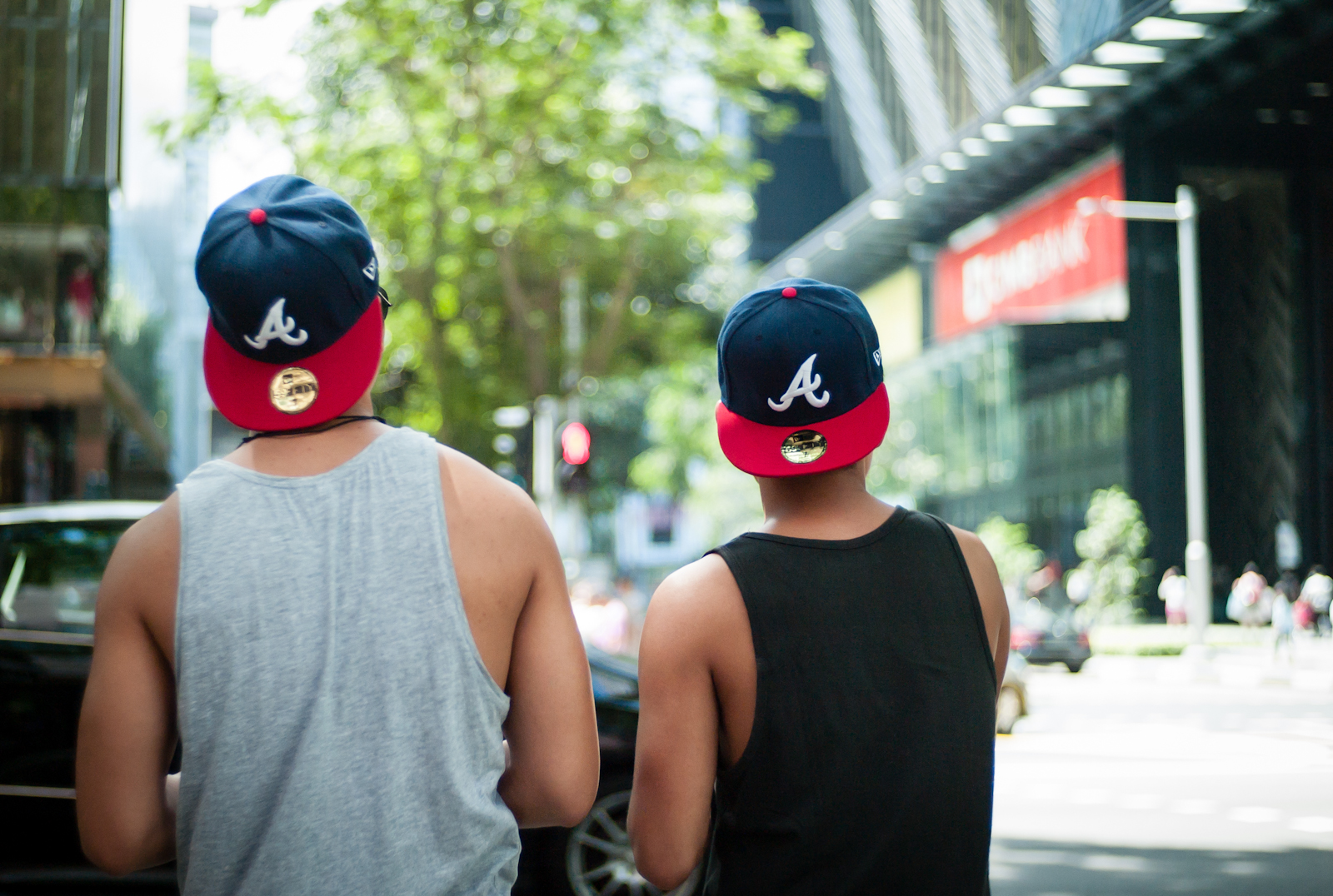 Two men wearing caps