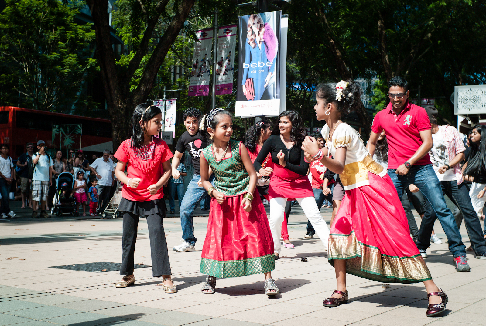 A group of Indian dancers in a flash mob along Orchard Road